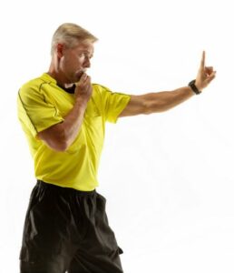 referee making fault gesture